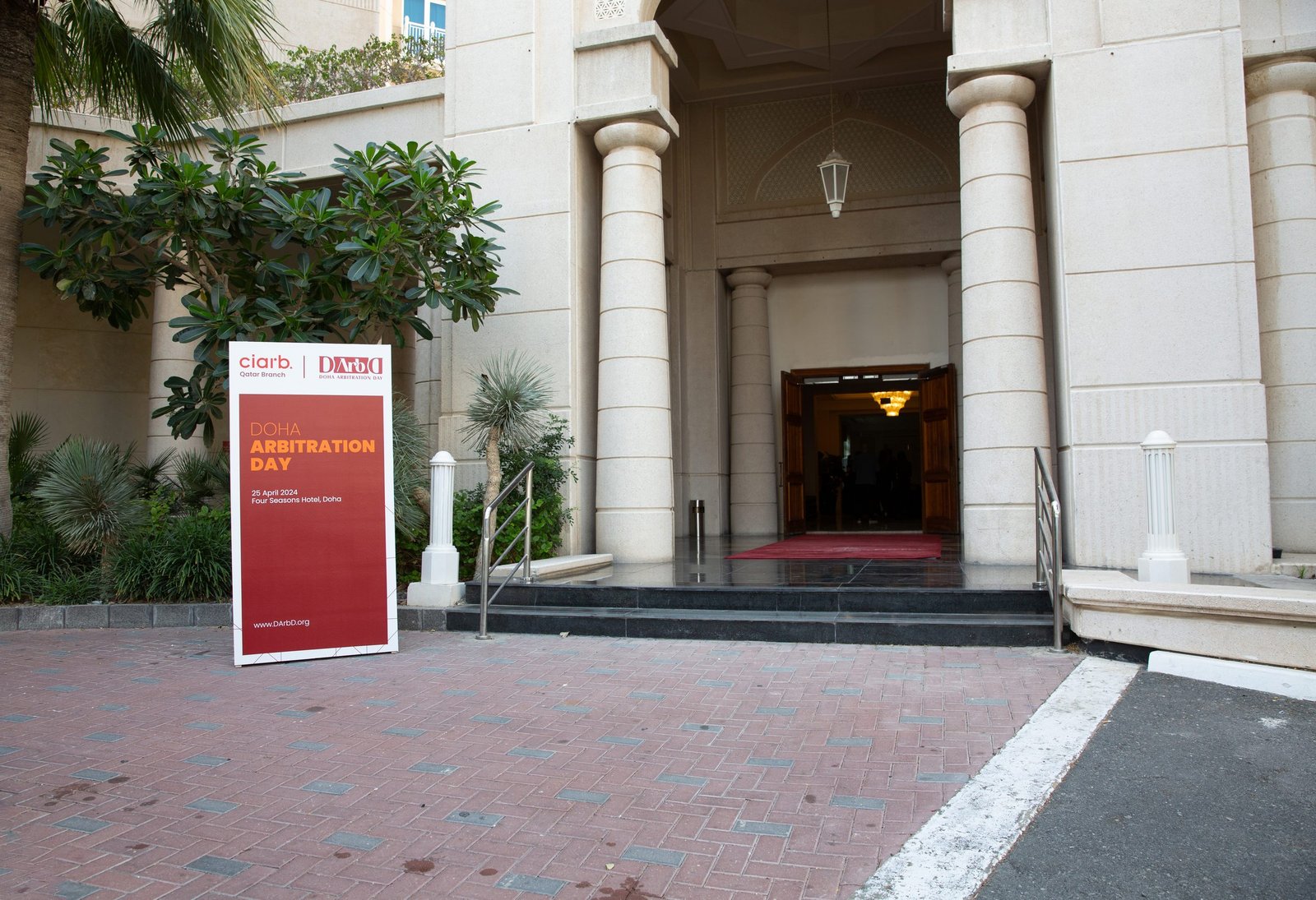 Event signage at the venue entrance, 1st Doha Arbitration Day