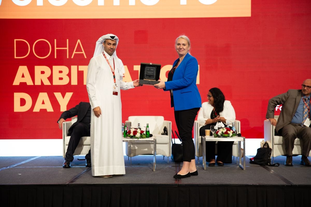 Award presented on stage at the 1st Doha Arbitration Day