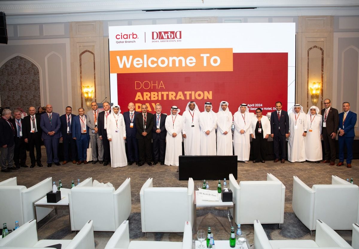 Group photograph on the main stage at the 1st Doha Arbitration Day