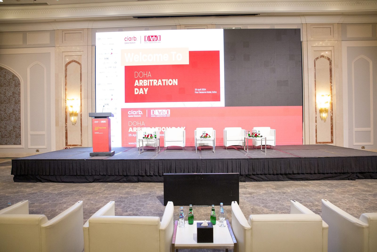 Main stage and backdrop before doors open at the 1st Doha Arbitration Day