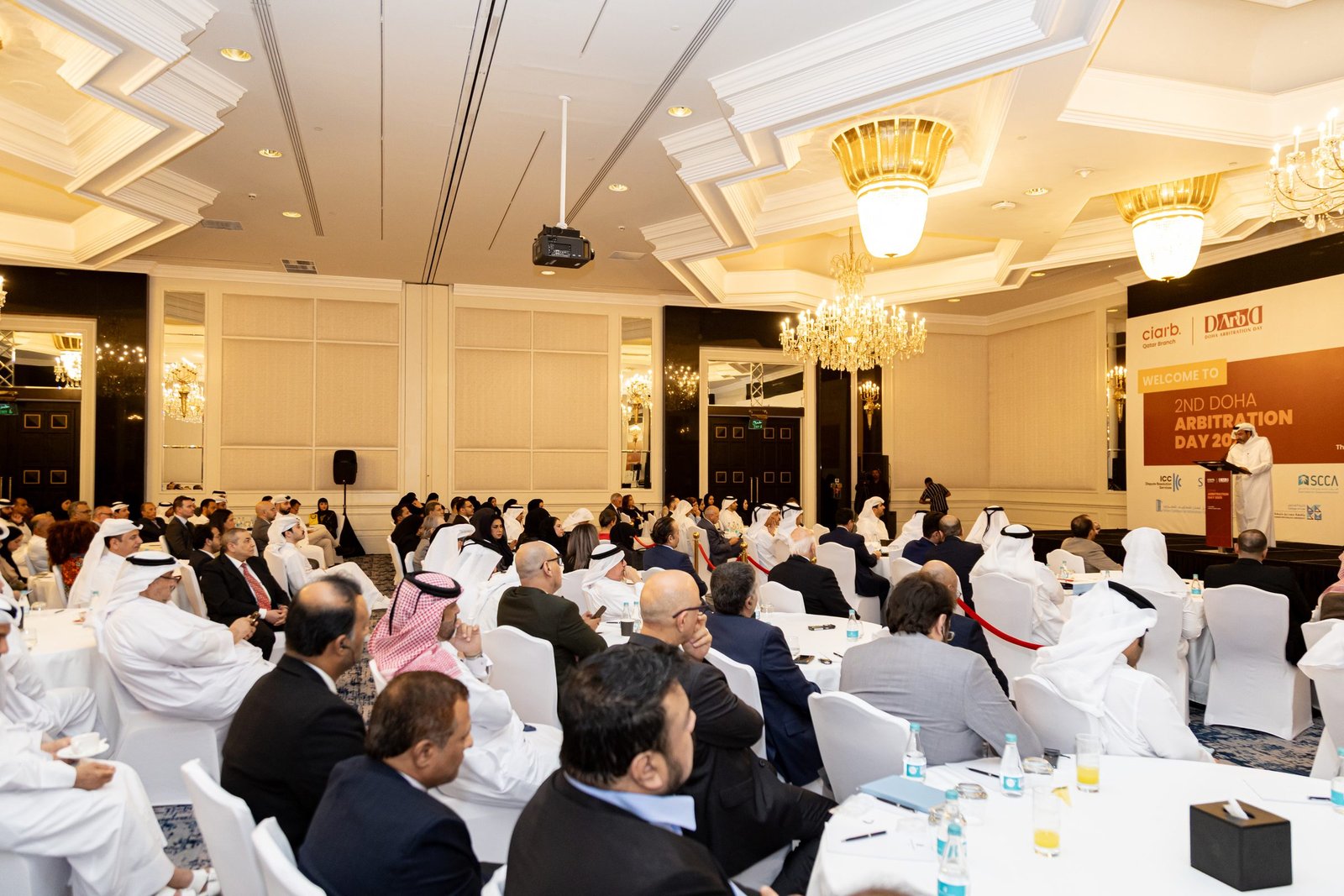 Delegates seated during a session at the 2nd Doha Arbitration Day