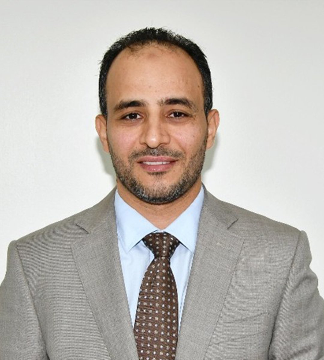 Portrait photograph of Khaled Elgarhe.