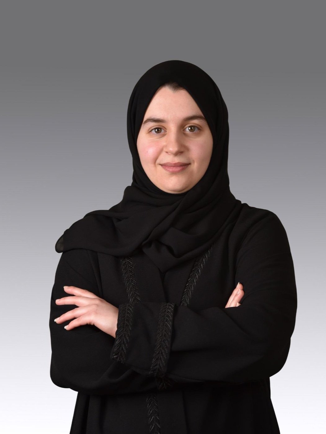 Portrait photograph of Dr Muna Al Marzouqi.